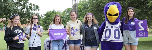 High school students posing during a campus tour.